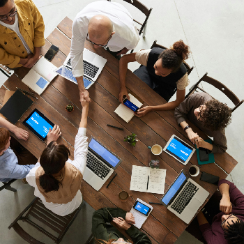 aerial view of people sitting in meeting